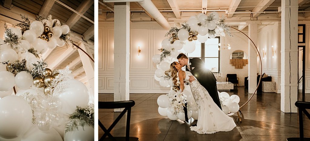 2 photos of a circle balloon wedding arch. One is a detail photo of the balloons in the arch with white, gold, and clear balloons decorated with greenery. The second image is of a wedding couple kissing at the same arch with the sun flaring behind them.