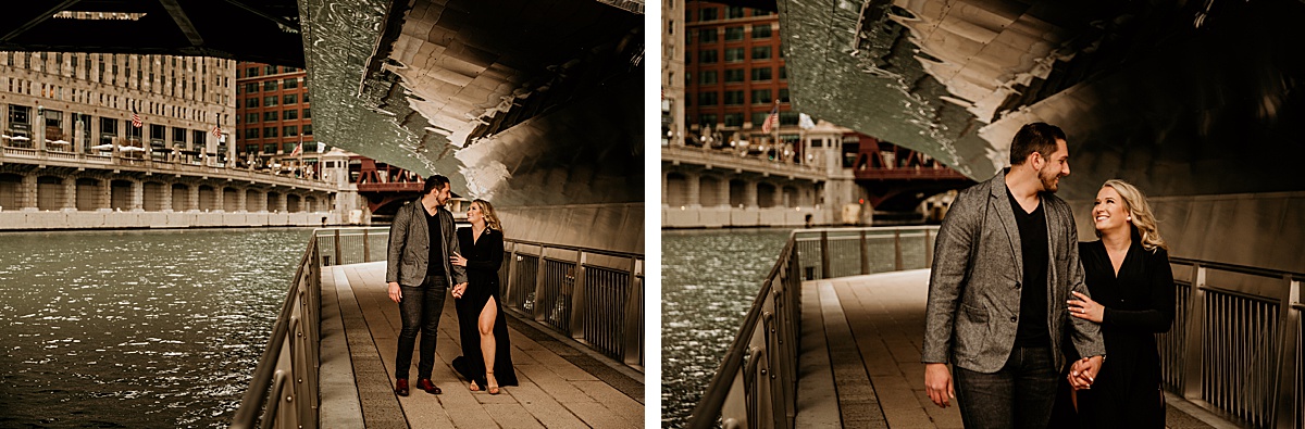 a young couple holding hands, walking on the chicago river walk