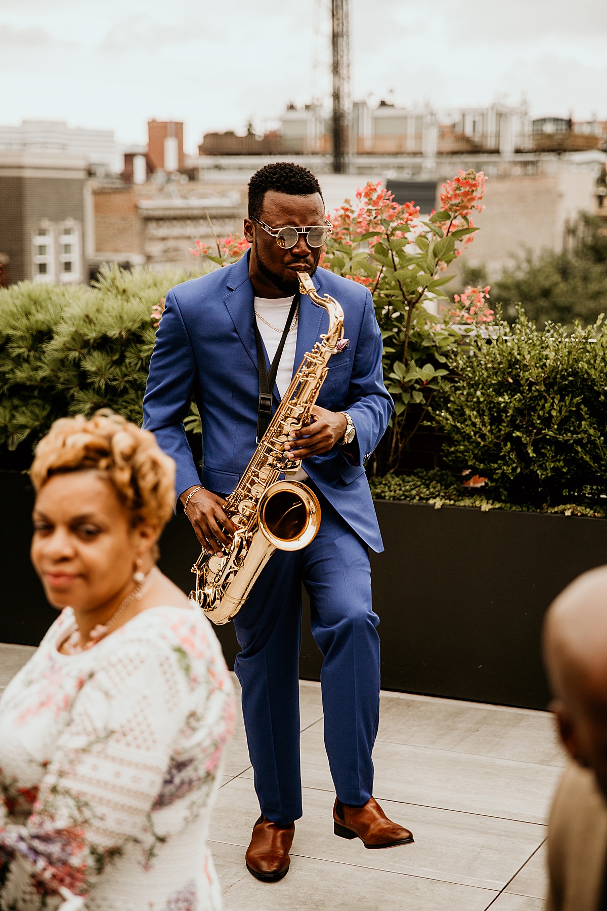 Saxophone player playing during a wedding ceremony.