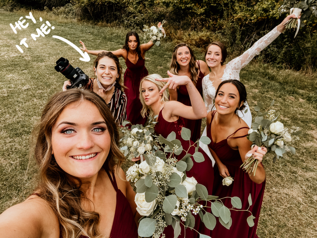 Wedding photographer taking a selfie with the bridesmaids.
