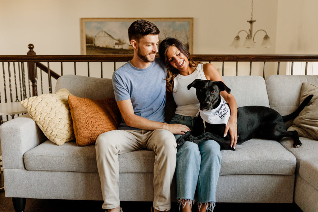 Couple's engagement photos in their home of chicago with their dog