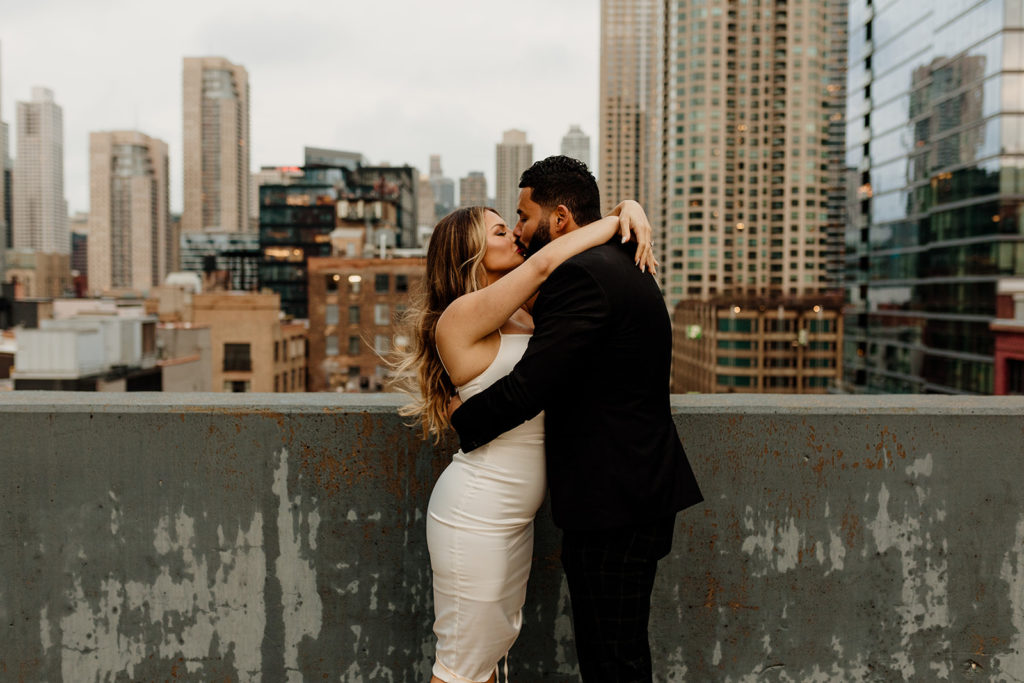 engaged couple in downtown chicago with skyline