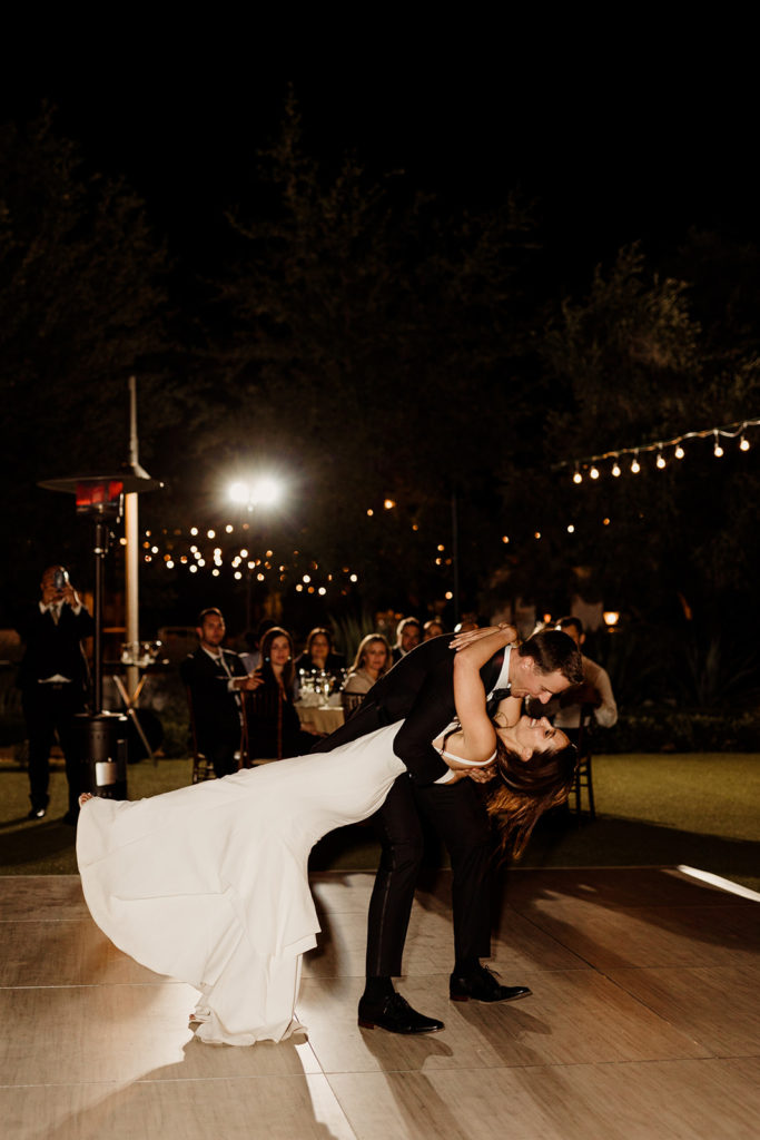wedding reception bride and groom first dance at night