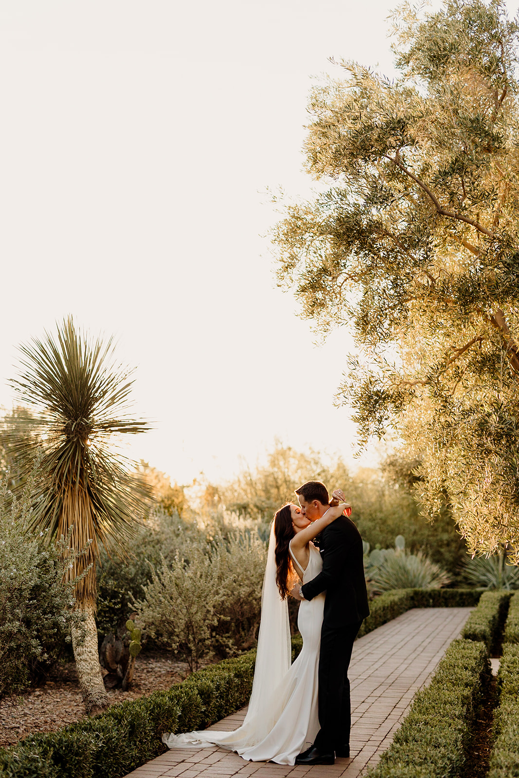 bride and groom kissing sunset portraits in arizona 