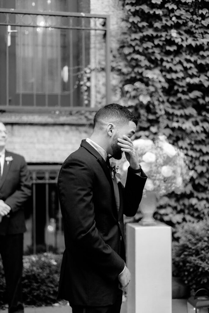 groom reaction to bride walking down the aisle on wedding day
